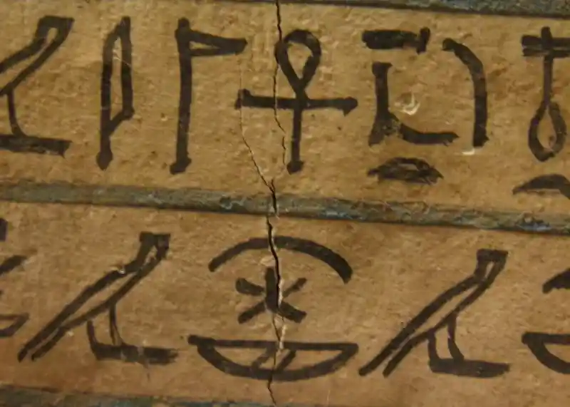 Ansated cross on an Egyptian artifact the Lady Meresimen in prayer before Osiris